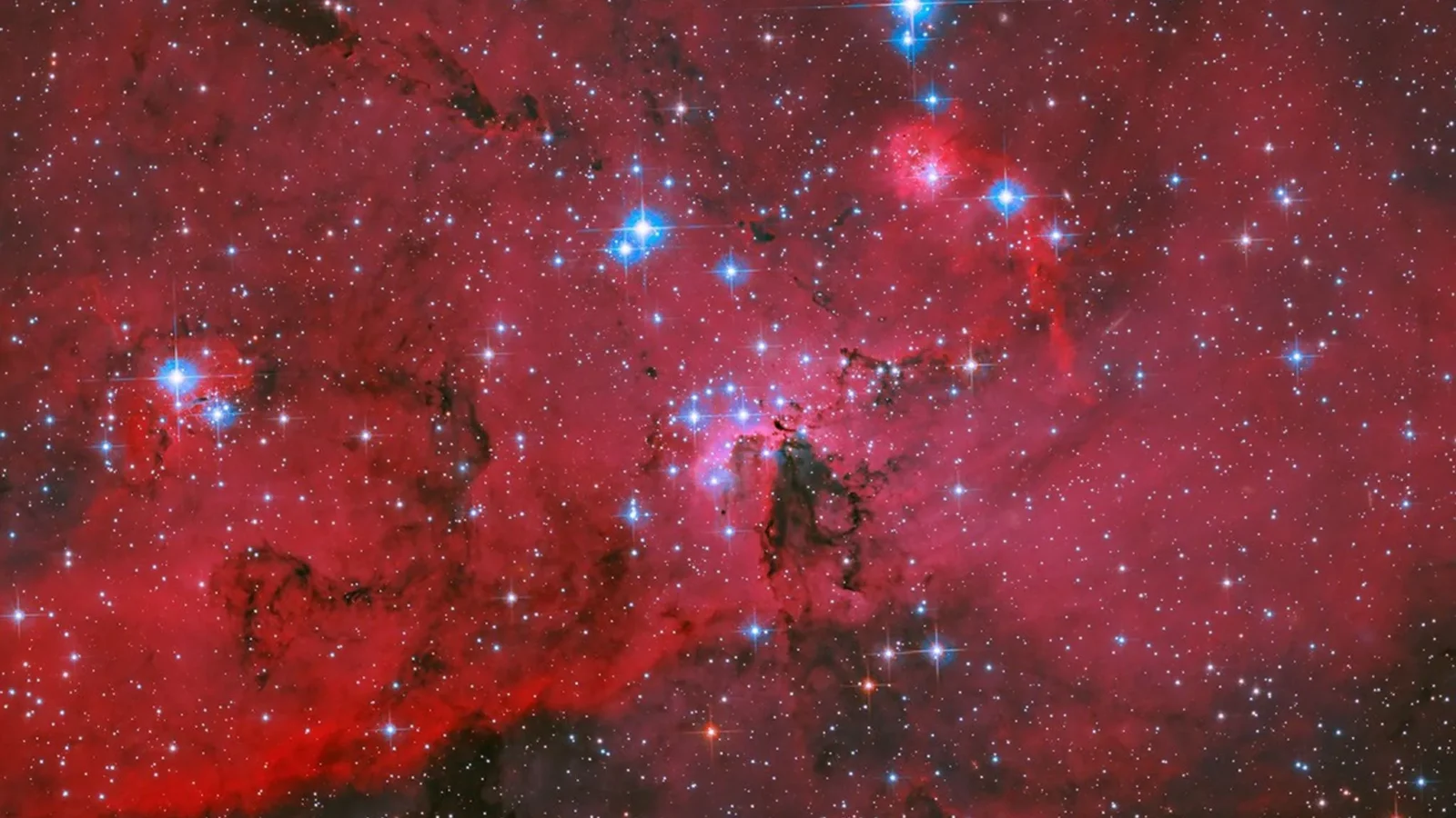 Espacio: Hubble retrata una nube carmesí de estrellas