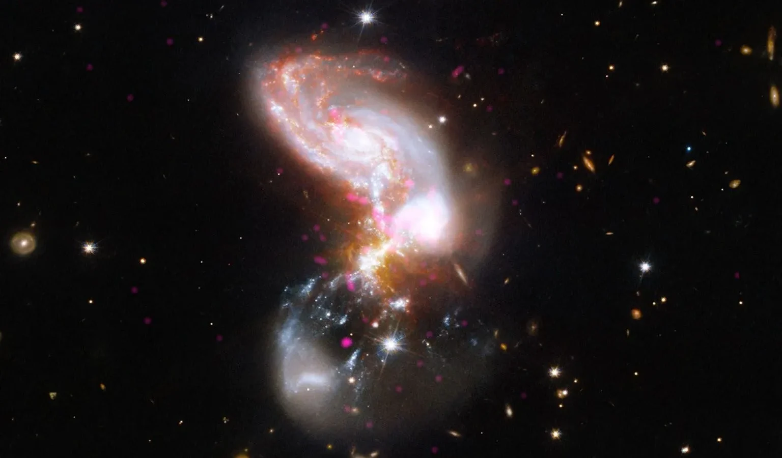 Espacio: Chandra retrata dos galaxias en plena fusión